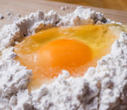 Pasta Machine Product Review Example with image of egg and flour 