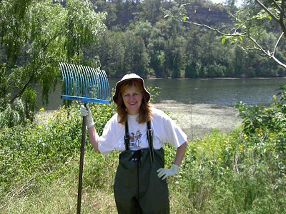 Lesley Postle researching aquatic weeds in her waders
